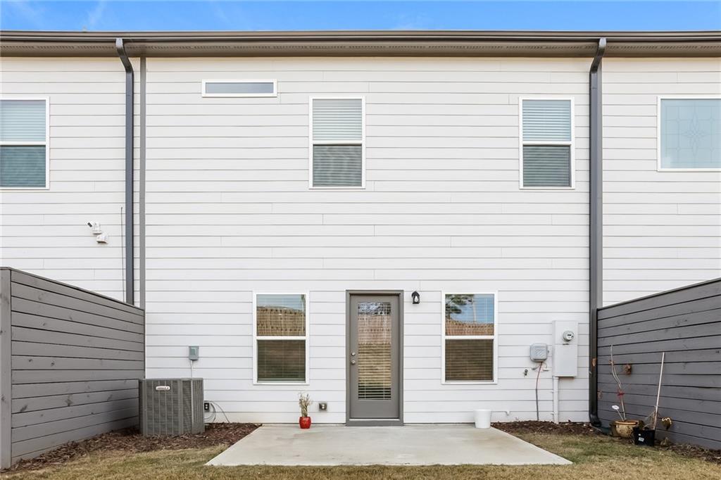36 Felton Walk Boulevard Cartersville, GA 30120 - Photo 15 of 15 a view of a house with more windows and brick wall