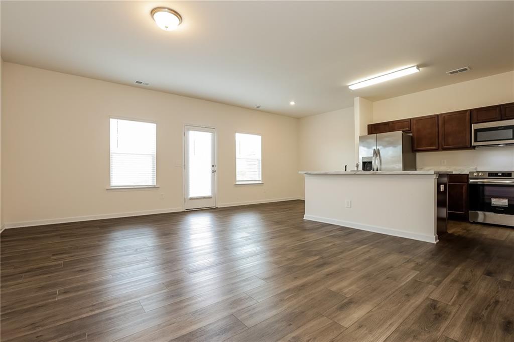 36 Felton Walk Boulevard Cartersville, GA 30120 - Photo 4 of 15 a view of a kitchen with microwave and cabinets