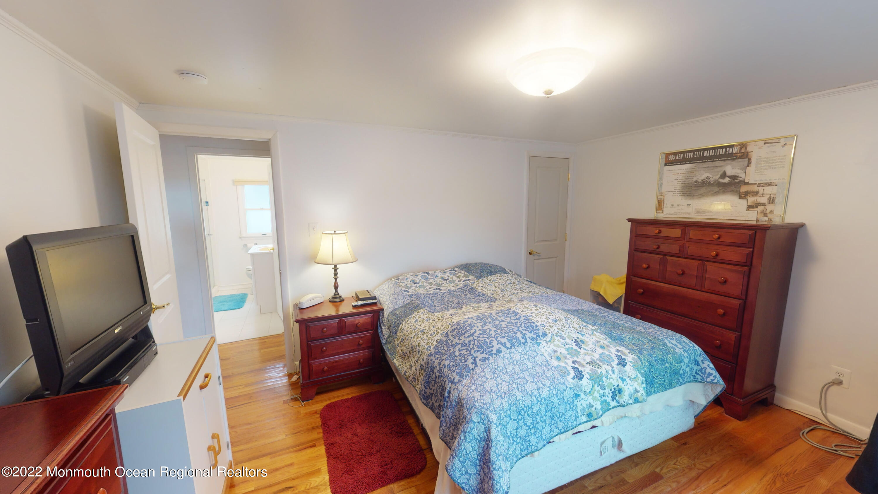 2 Funston Road Lavallette, NJ 08735 - Photo 13 of 24 a bedroom with a bed and a flat screen tv