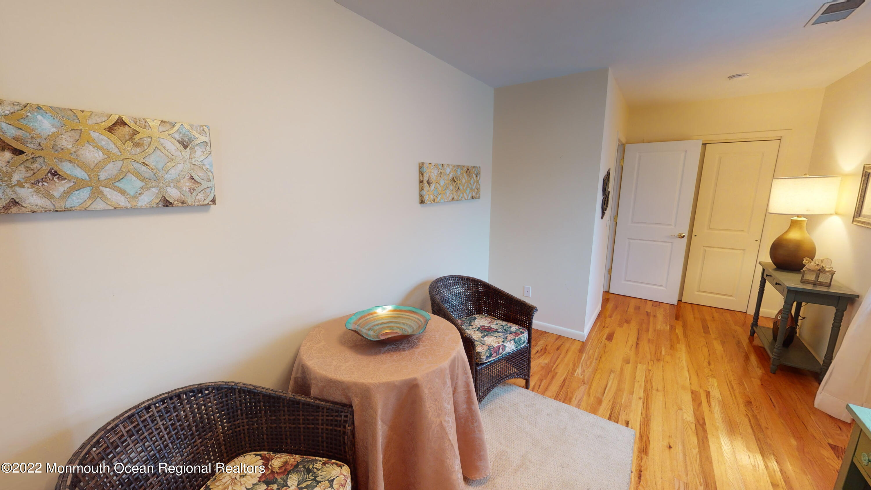 2 Funston Road Lavallette, NJ 08735 - Photo 17 of 24 a bedroom with a bed and wooden floor