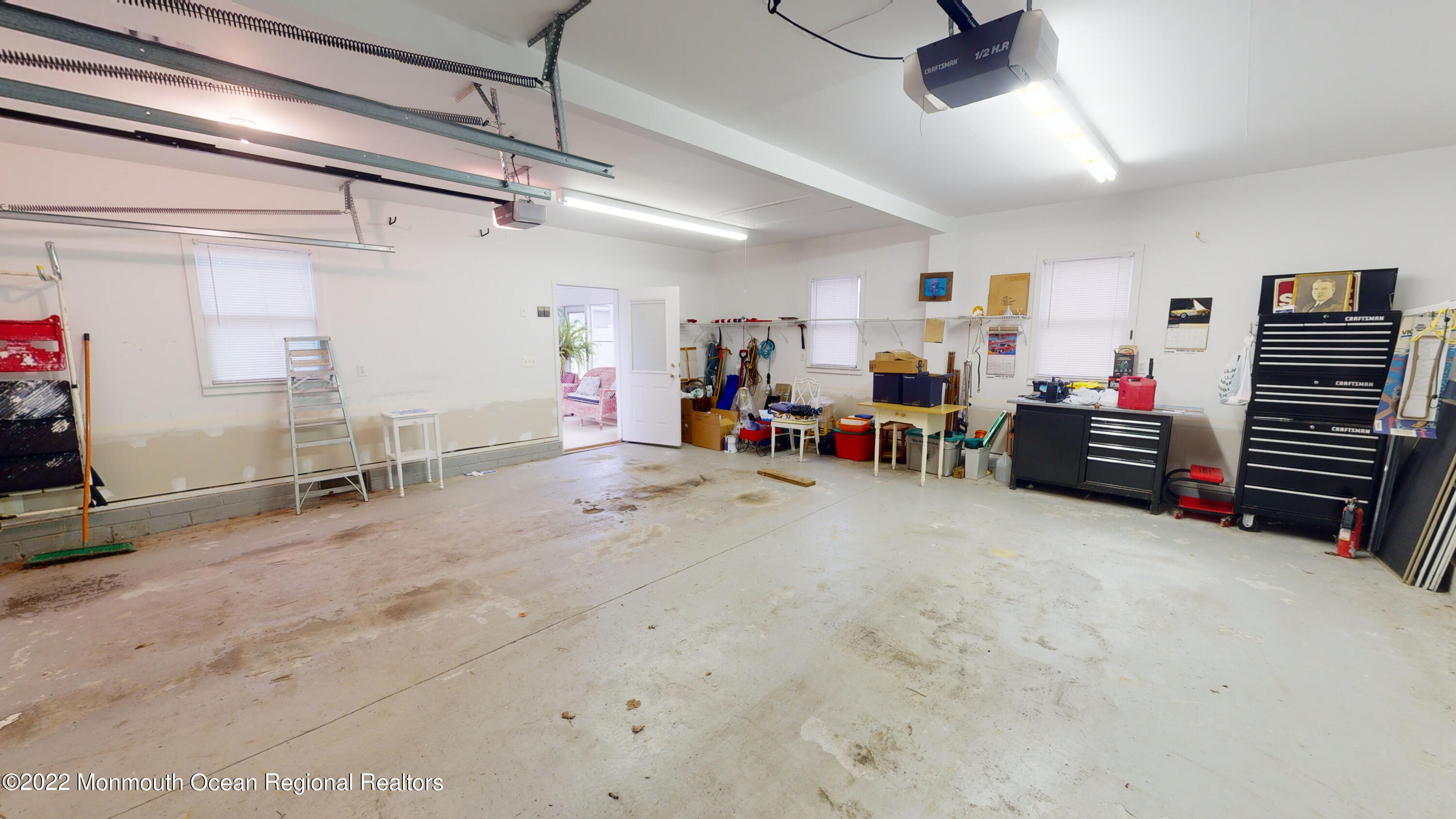 2 Funston Road Lavallette, NJ 08735 - Photo 19 of 24 a view of a livingroom with furniture and a ceiling fan