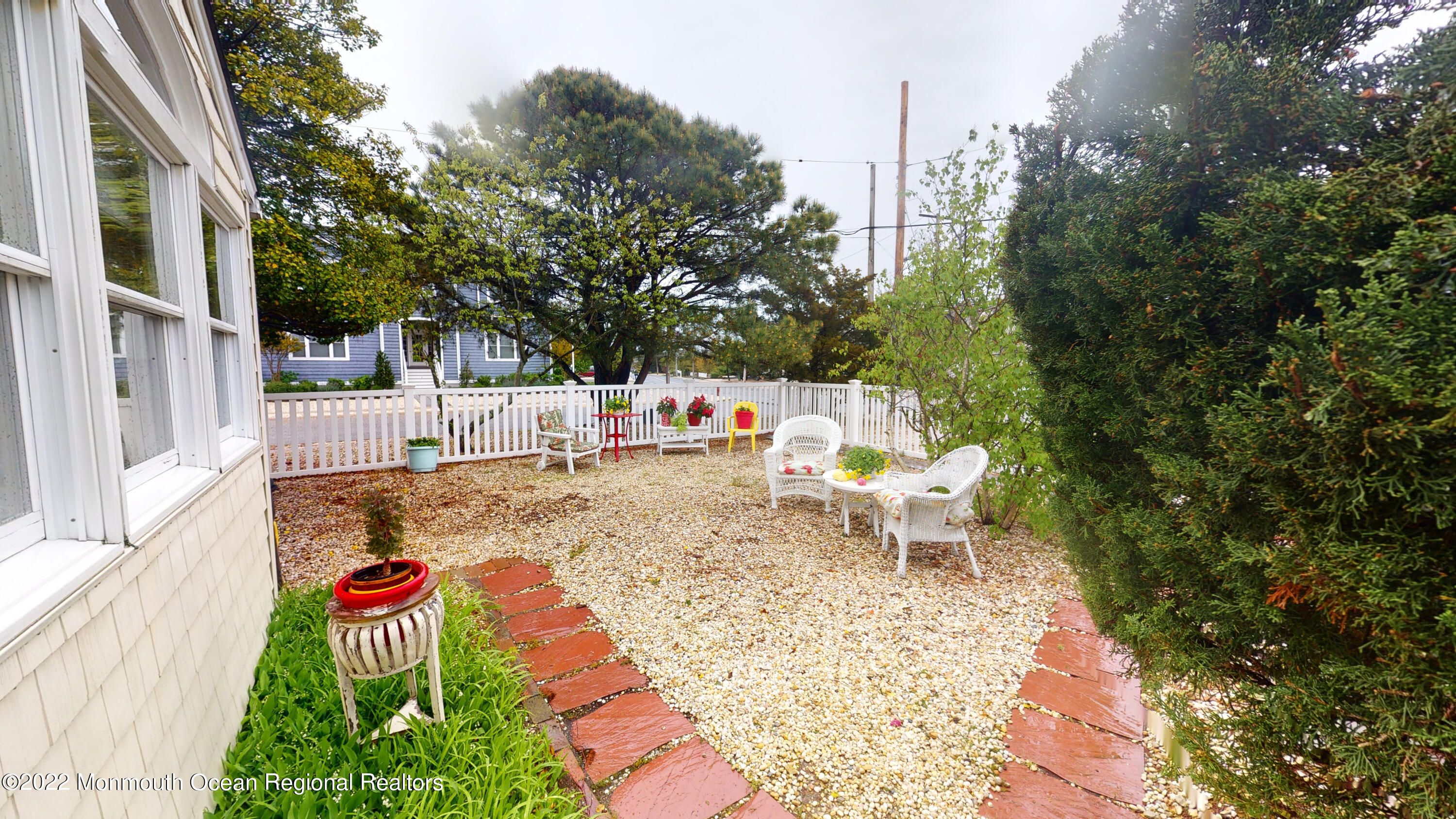 2 Funston Road Lavallette, NJ 08735 - Photo 22 of 24 a view of a chairs and table in the backyard of the house