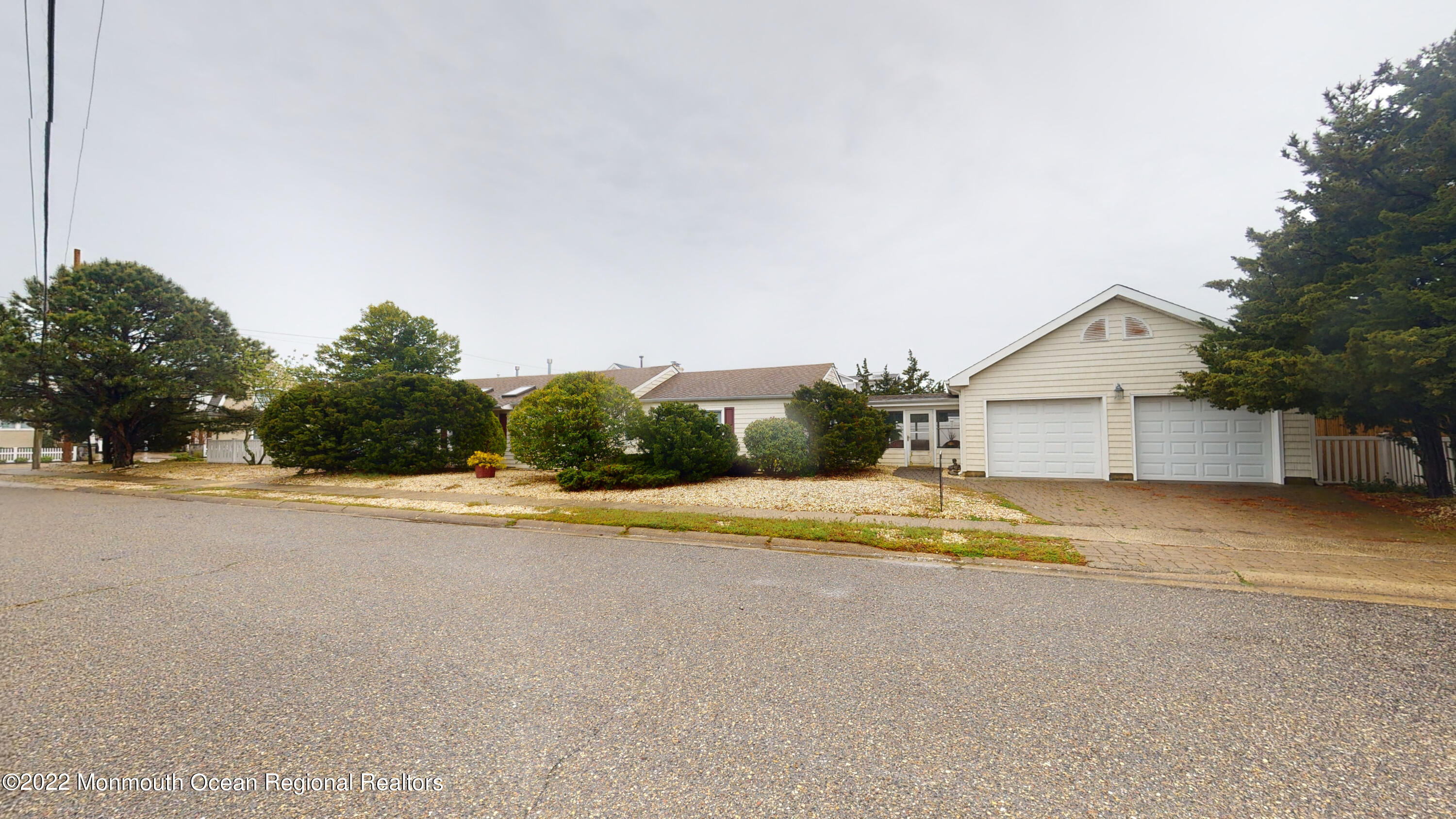 2 Funston Road Lavallette, NJ 08735 - Photo 24 of 24 a view of a house with pool and a yard with palm trees