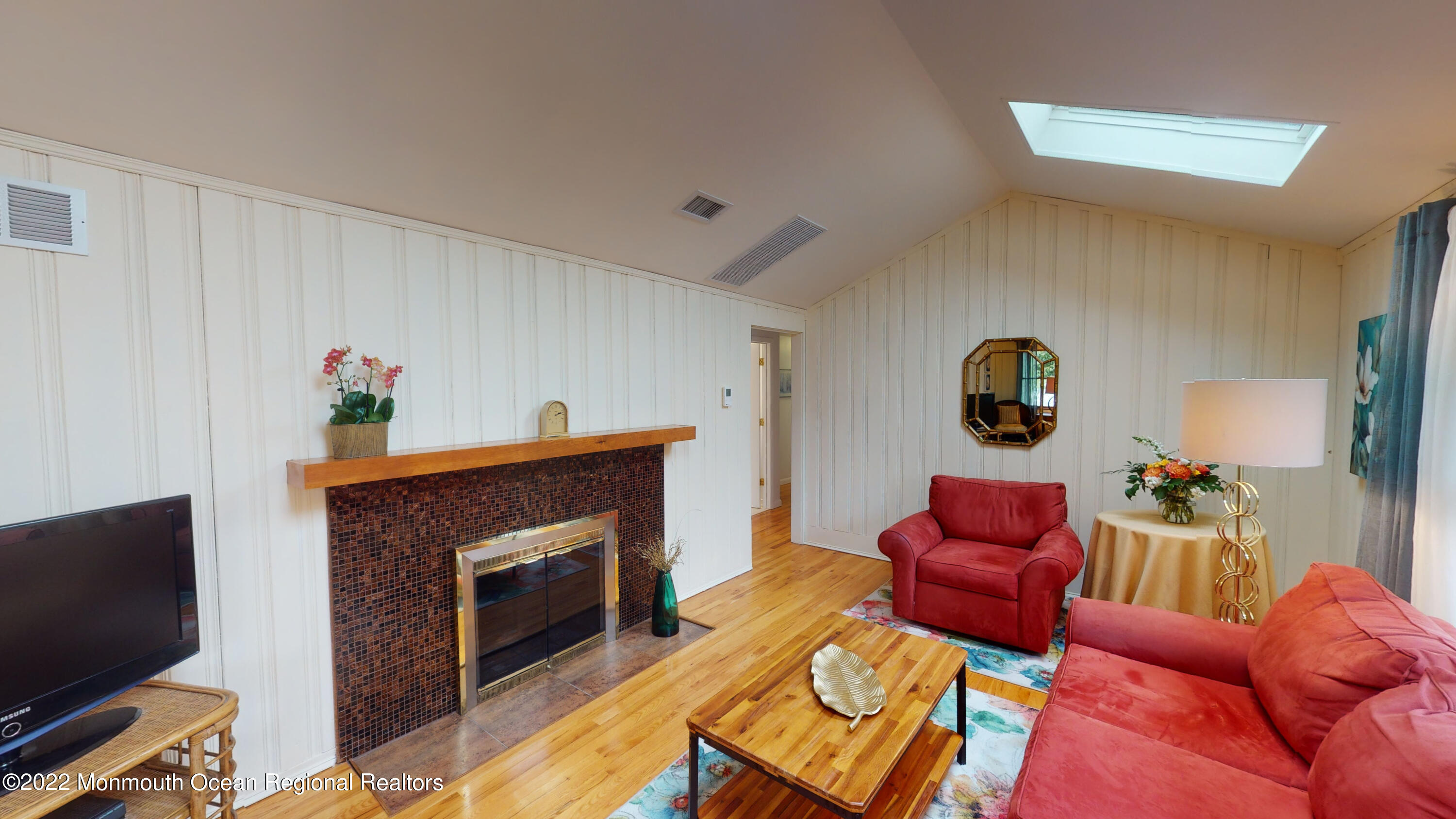 2 Funston Road Lavallette, NJ 08735 - Photo 8 of 24 a living room with furniture and a fireplace