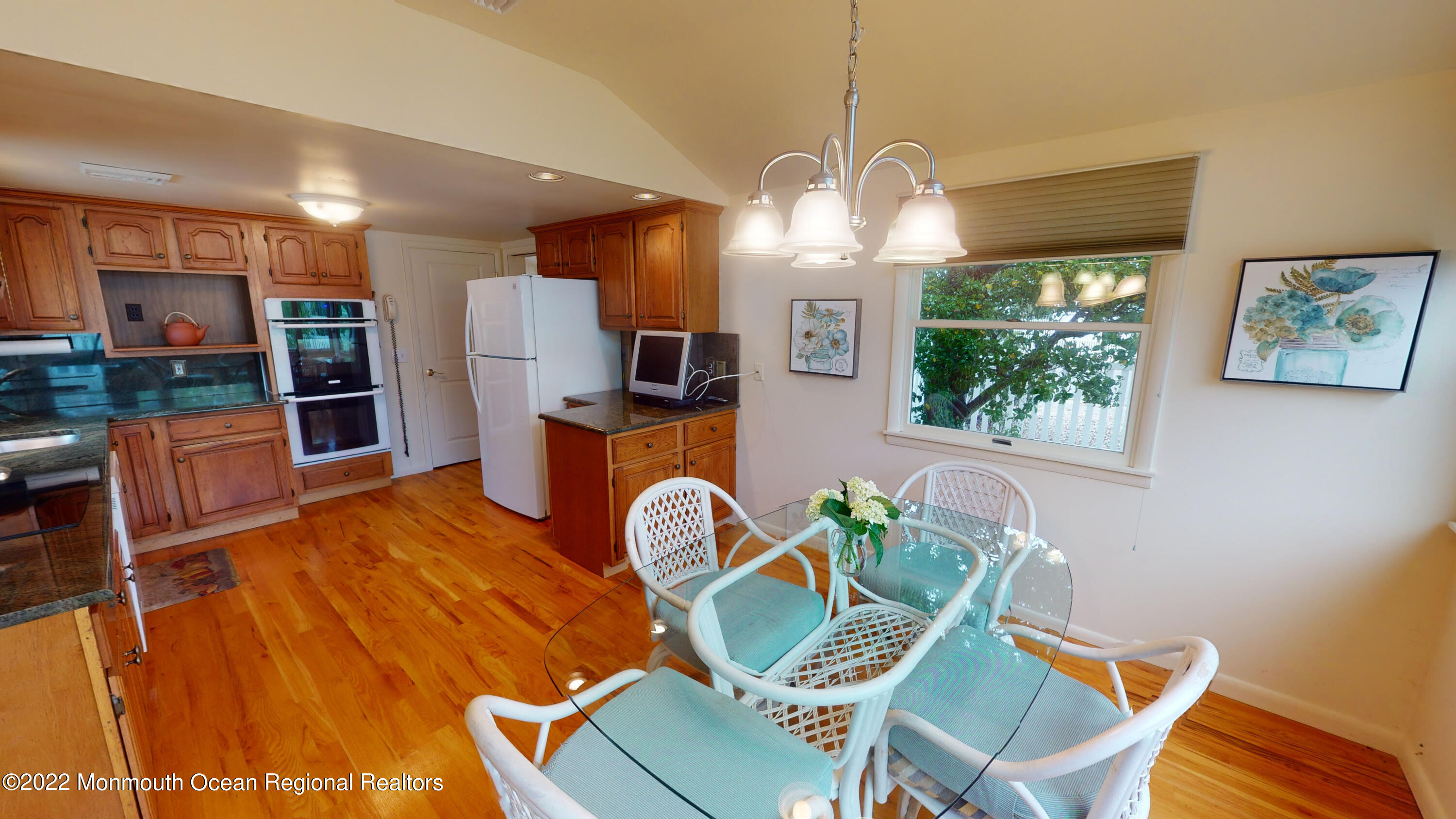 2 Funston Road Lavallette, NJ 08735 - Photo 10 of 24 a view of a dining room with furniture a chandelier and wooden floor