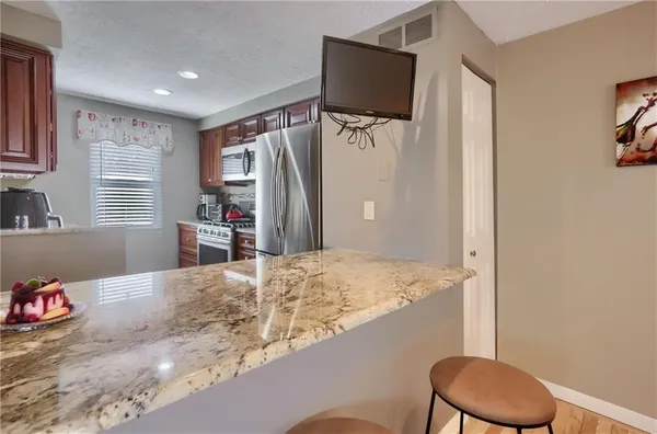 a view of a dining room with furniture