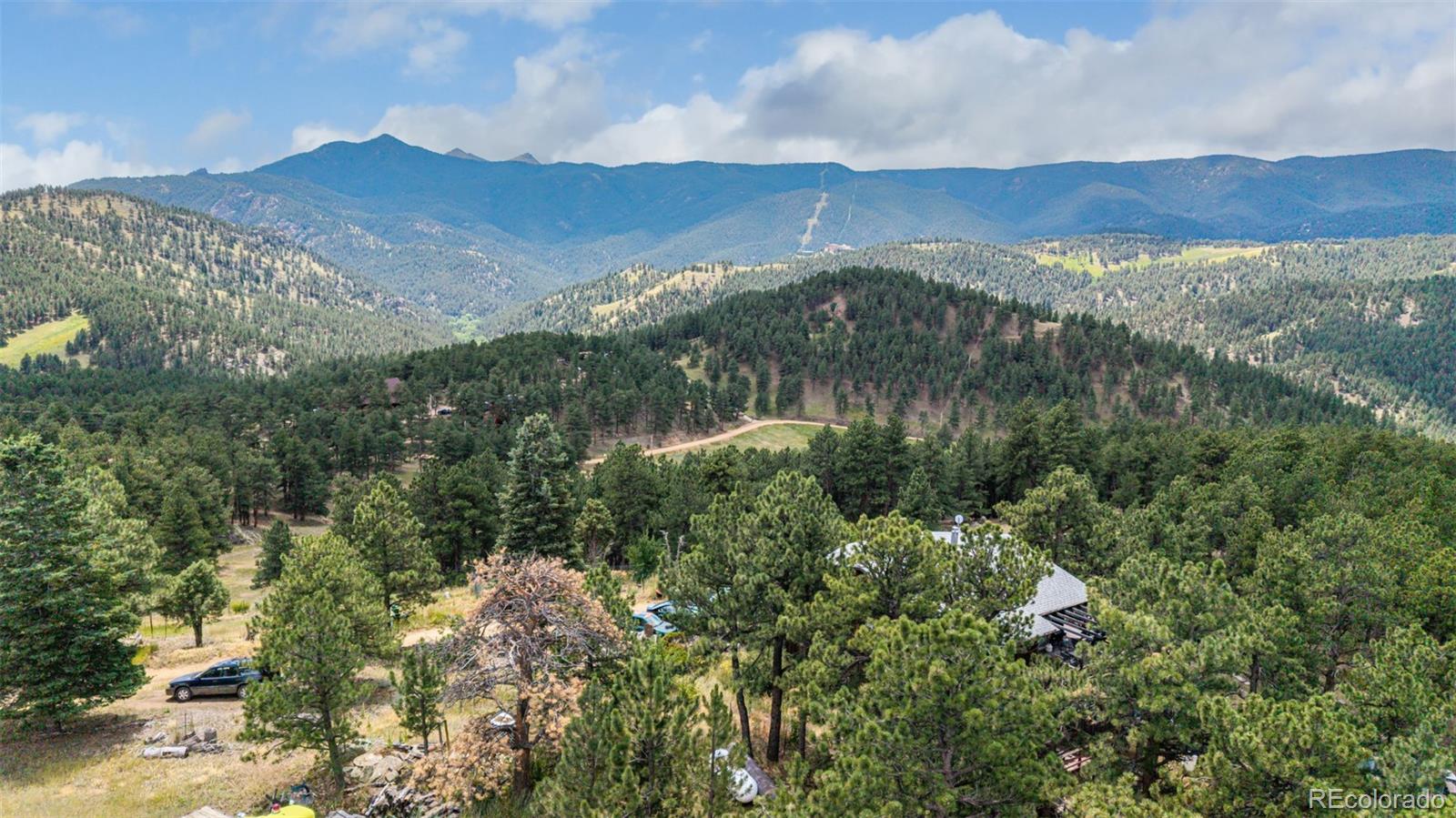 398 Leonards Road Boulder, CO 80302 - Photo 17 of 34 a view of a city with mountains in the background