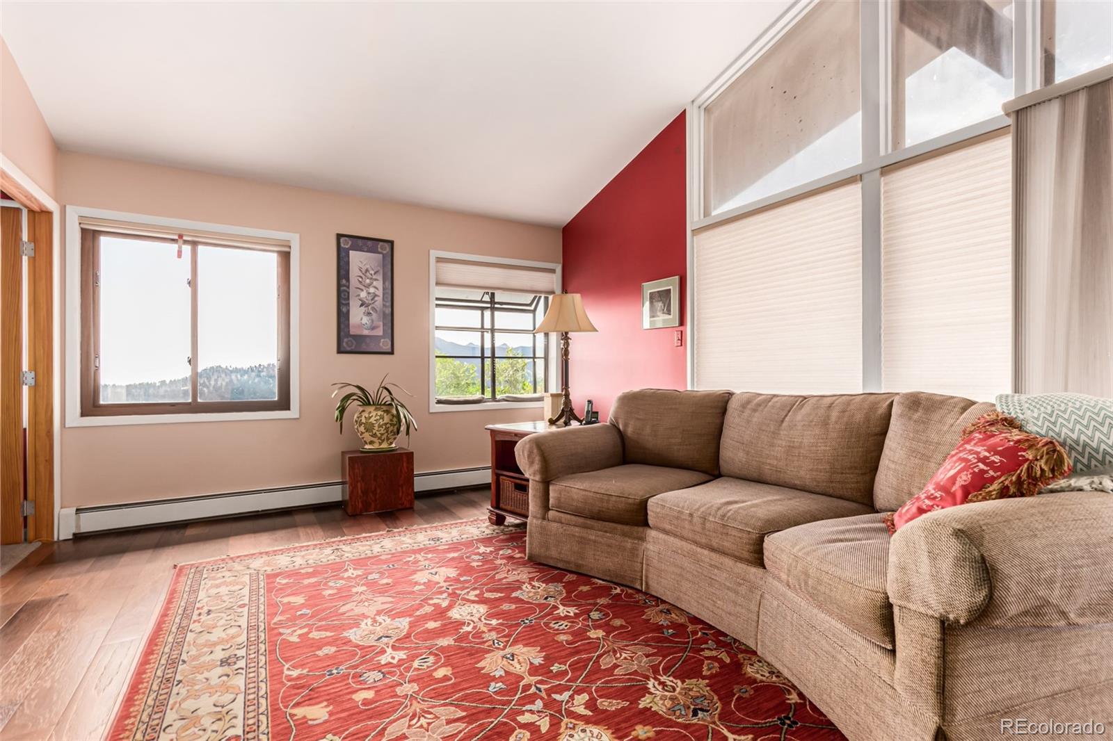 398 Leonards Road Boulder, CO 80302 - Photo 3 of 34 a living room with furniture and a window