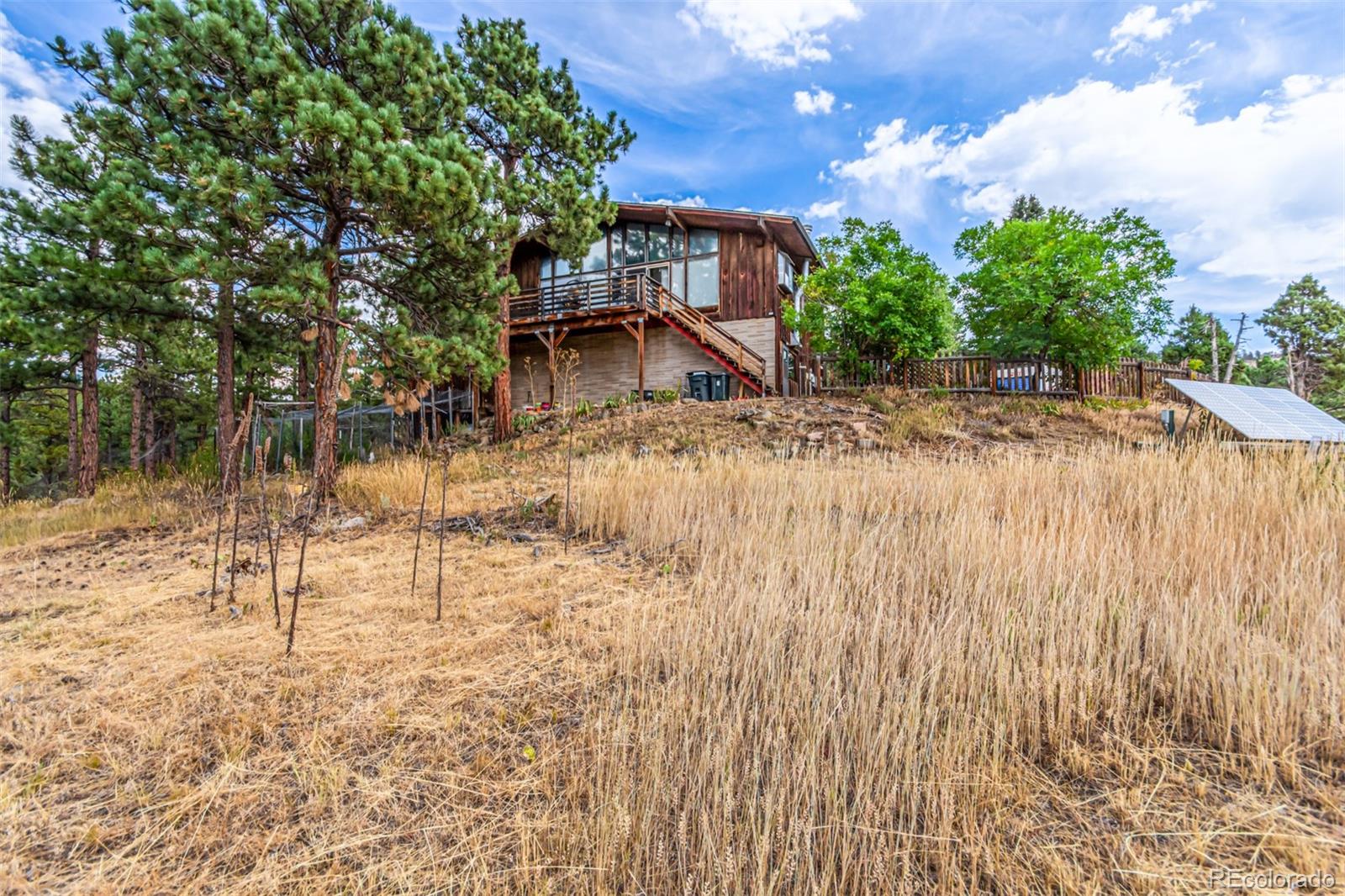 398 Leonards Road Boulder, CO 80302 - Photo 33 of 34 a view of a backyard of the house