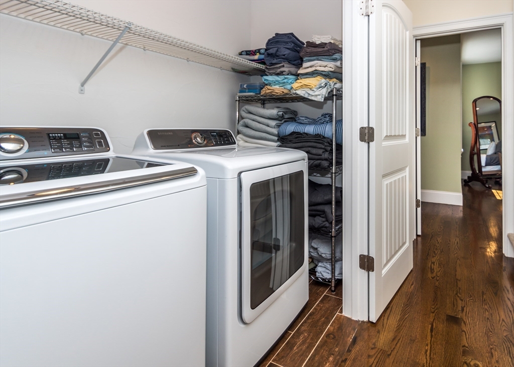128 Church Street, Unit 2 Waltham, MA 02452 - Photo 24 of 41 a utility room with dryer and washer