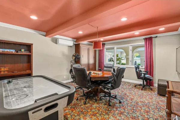 a workspace with furniture and a rug