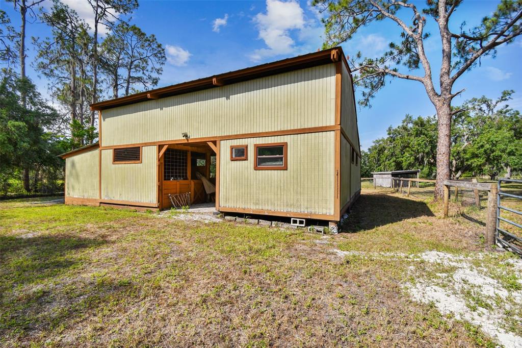 2853 Saffold Road Wimauma, FL 33598 - Photo 9 of 62 a view of a back yard of the house