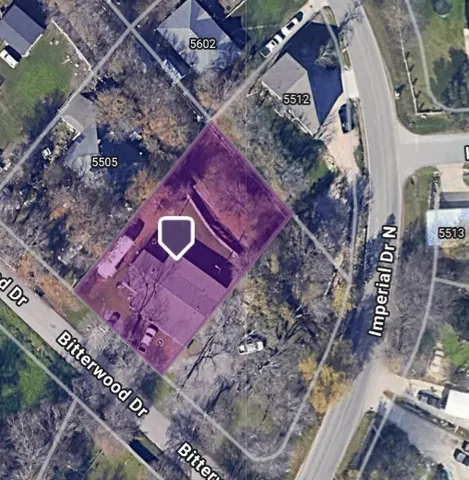a living room with furniture potted plant and a window