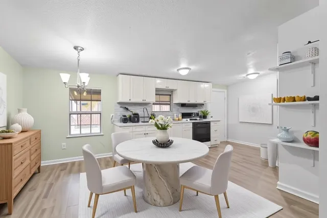 a bedroom with bed and a window