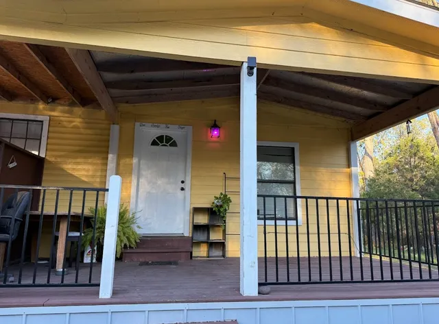 a view of entryway with wooden floor