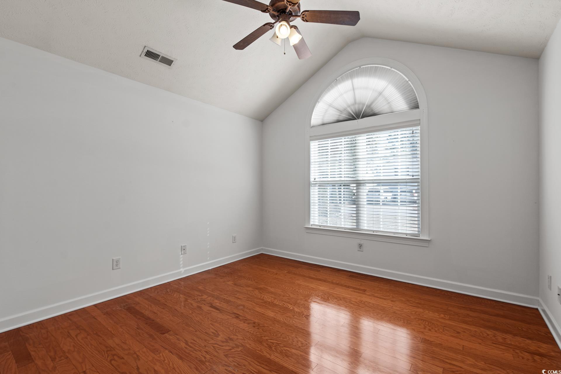 126 Pickering Drive Murrells Inlet, SC 29576 - Photo 25 of 40 Unfurnished room with hardwood / wood-style floori