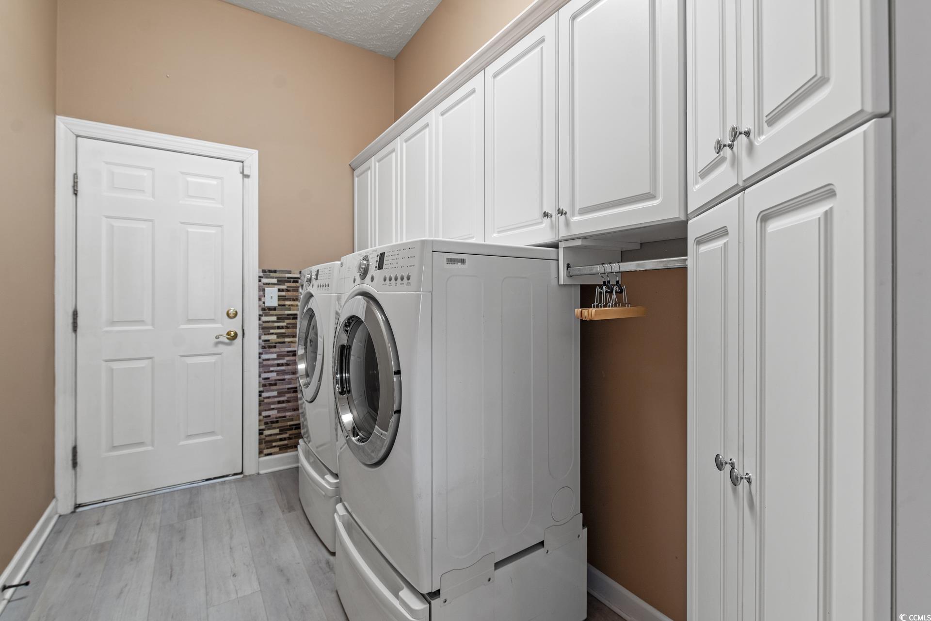 126 Pickering Drive Murrells Inlet, SC 29576 - Photo 30 of 40 Washroom featuring washing machine and dryer, cabi