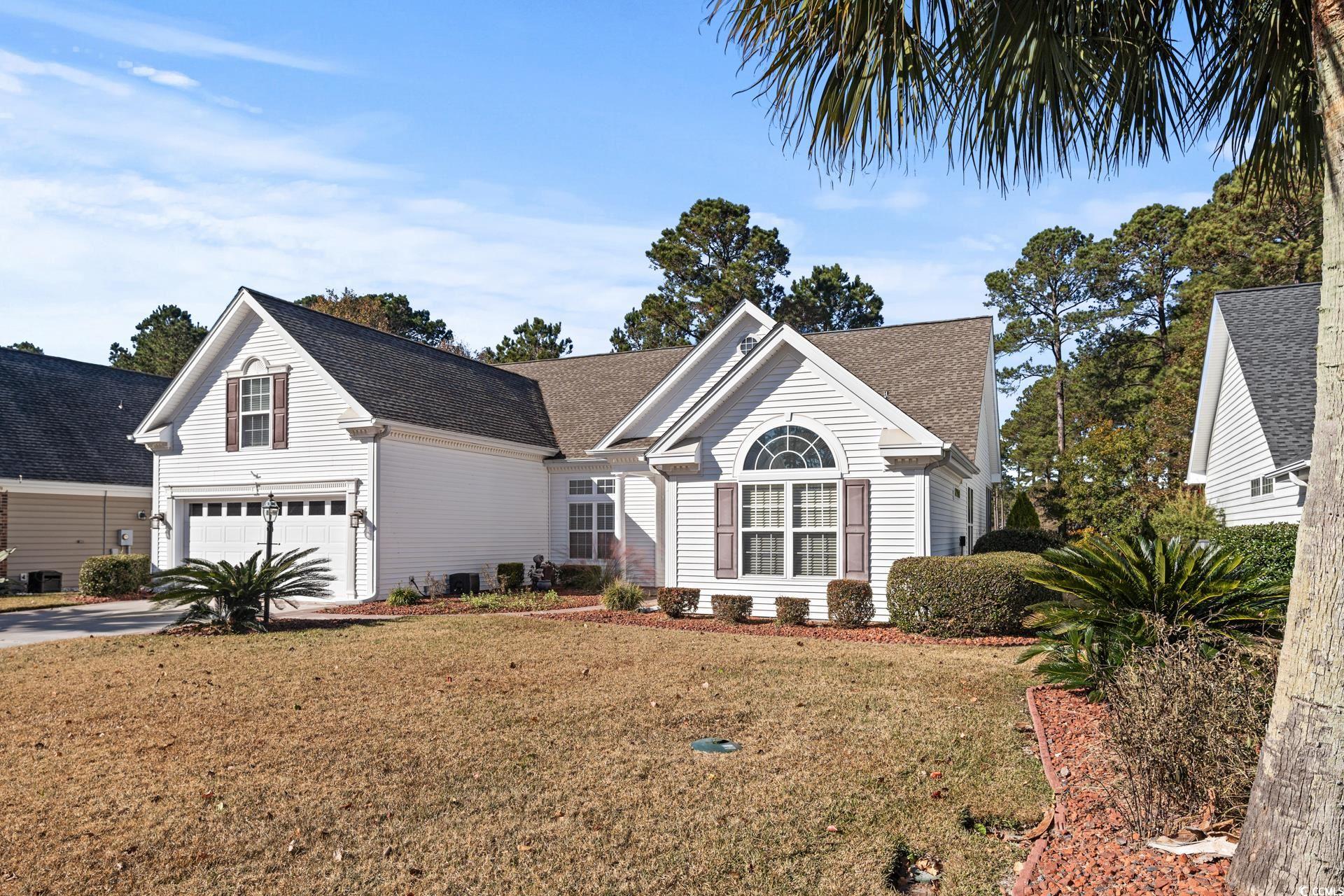 126 Pickering Drive Murrells Inlet, SC 29576 - Photo 37 of 40 View of front facade with a front yard and a garag