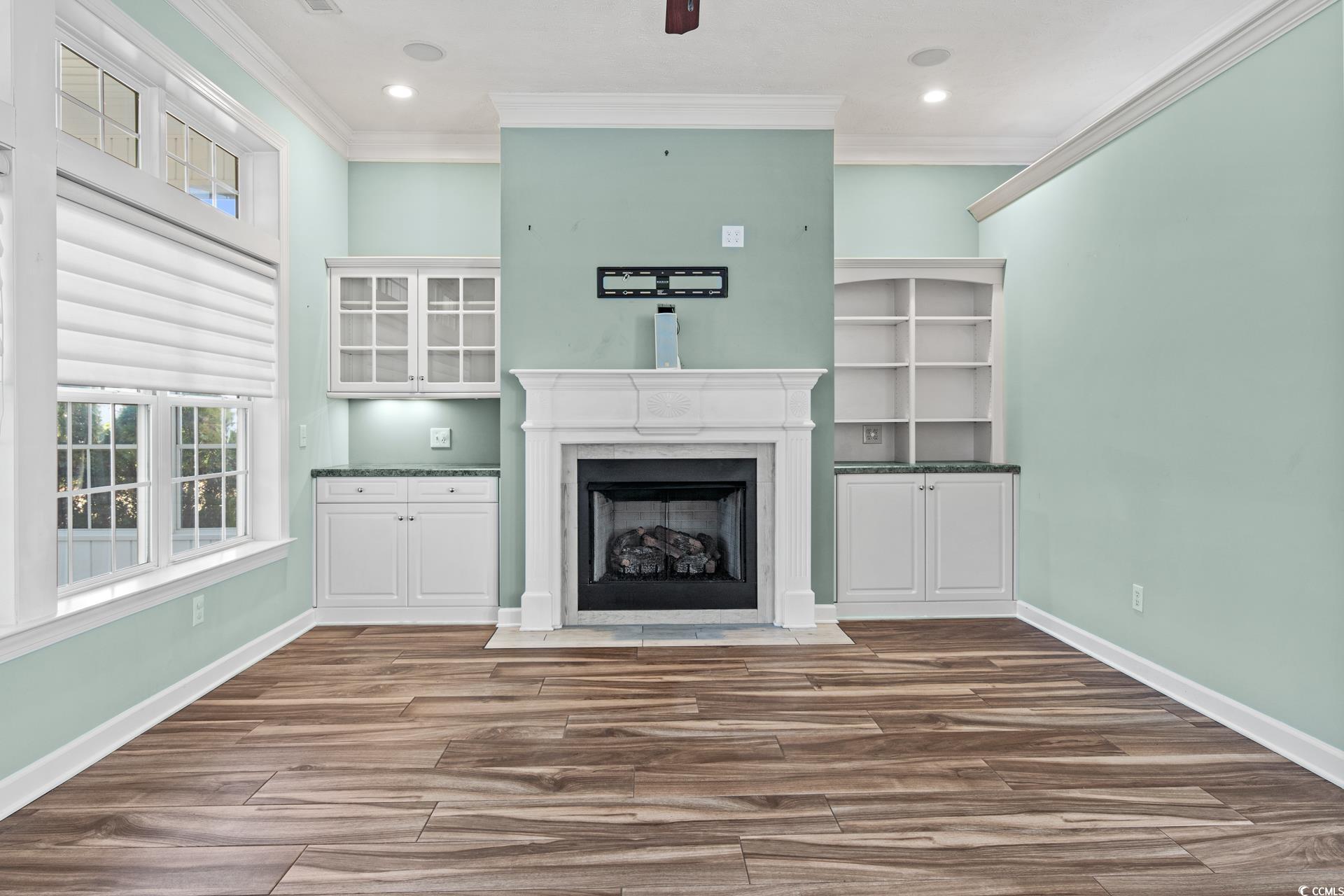 126 Pickering Drive Murrells Inlet, SC 29576 - Photo 7 of 40 Unfurnished living room with a premium fireplace,