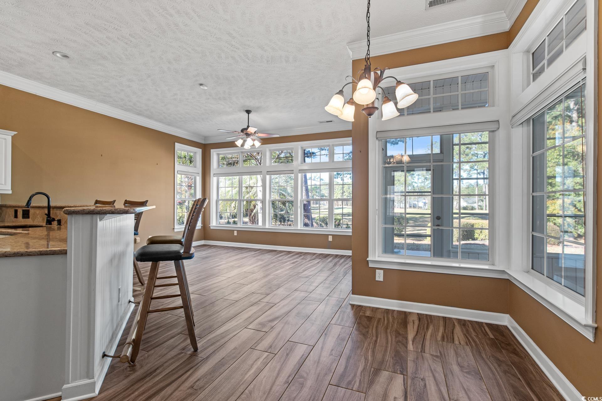 126 Pickering Drive Murrells Inlet, SC 29576 - Photo 9 of 40 Unfurnished sunroom featuring ceiling fan with not