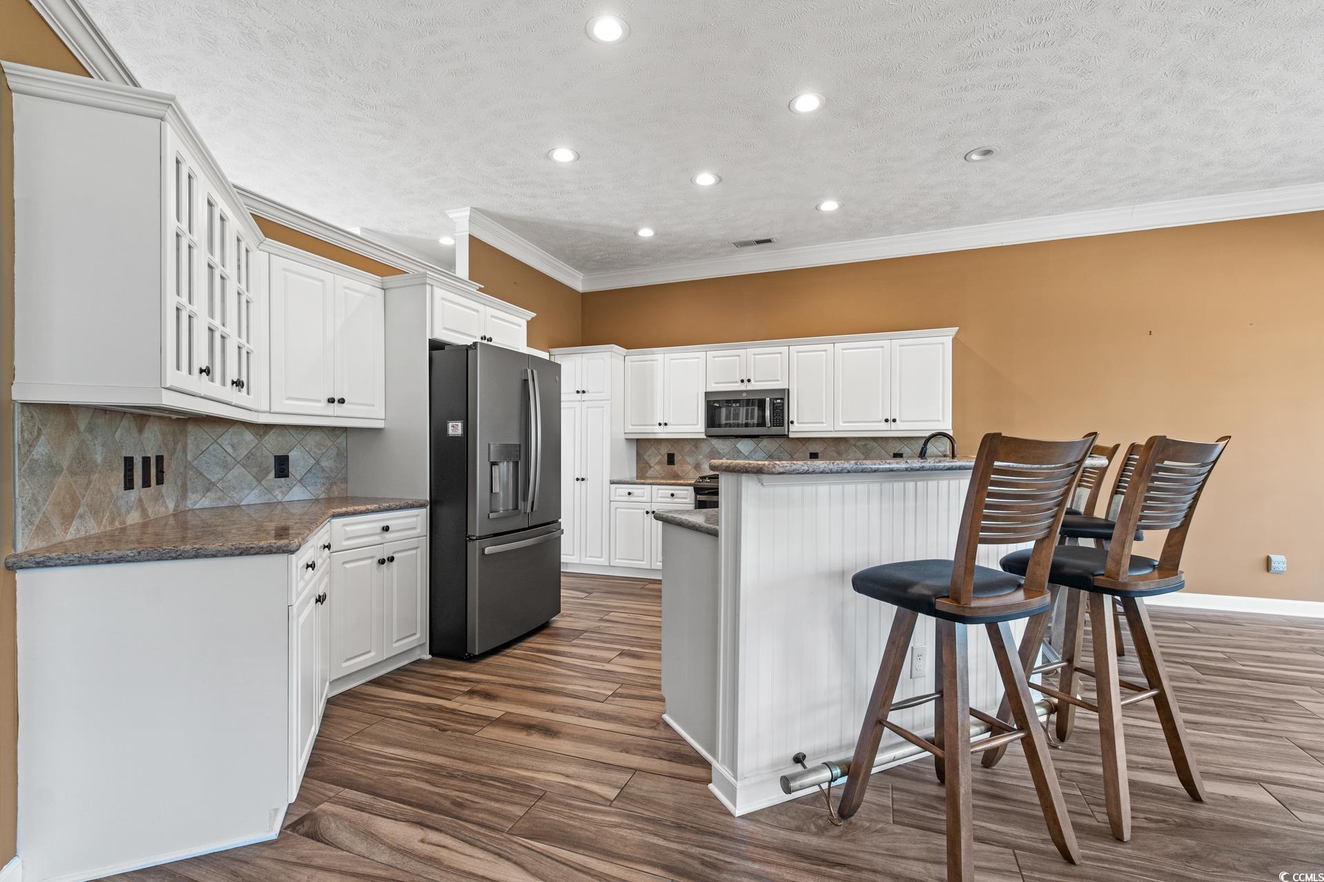 126 Pickering Drive Murrells Inlet, SC 29576 - Photo 10 of 40 Kitchen featuring stainless steel appliances, a ki