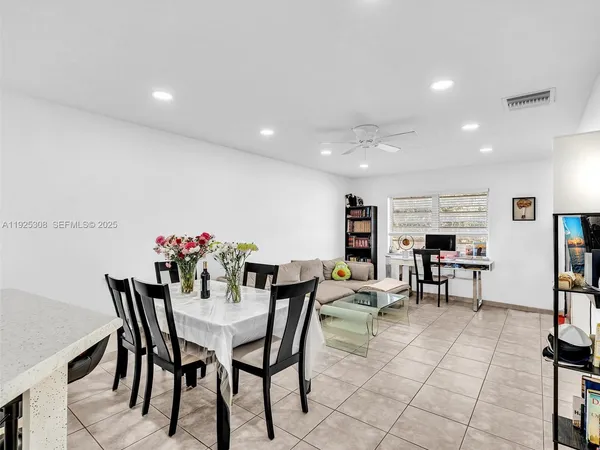 a view of a dining room with furniture