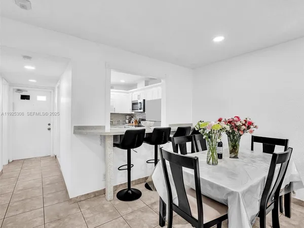 a view of a dining room with furniture