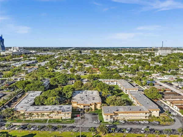 an aerial view of a city with lots of residential buildings
