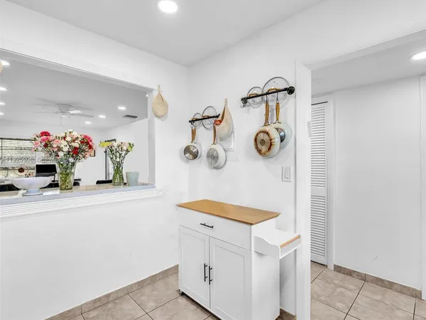 a view of kitchen and utility room