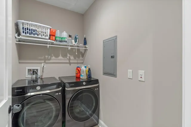 a utility room with dryer and washer