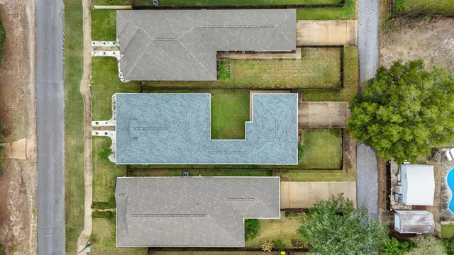 an aerial view of a house having yard