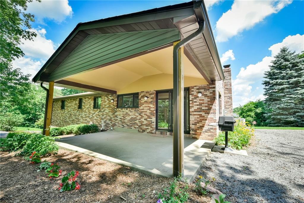 2337 Nicholson Road Franklin Park, PA 15143 - Photo 23 of 25 Rain or shine. No worries when you have a covered patio and gas grill.