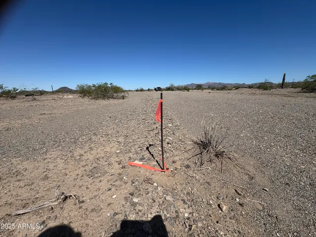 a view of lake with mountain in background