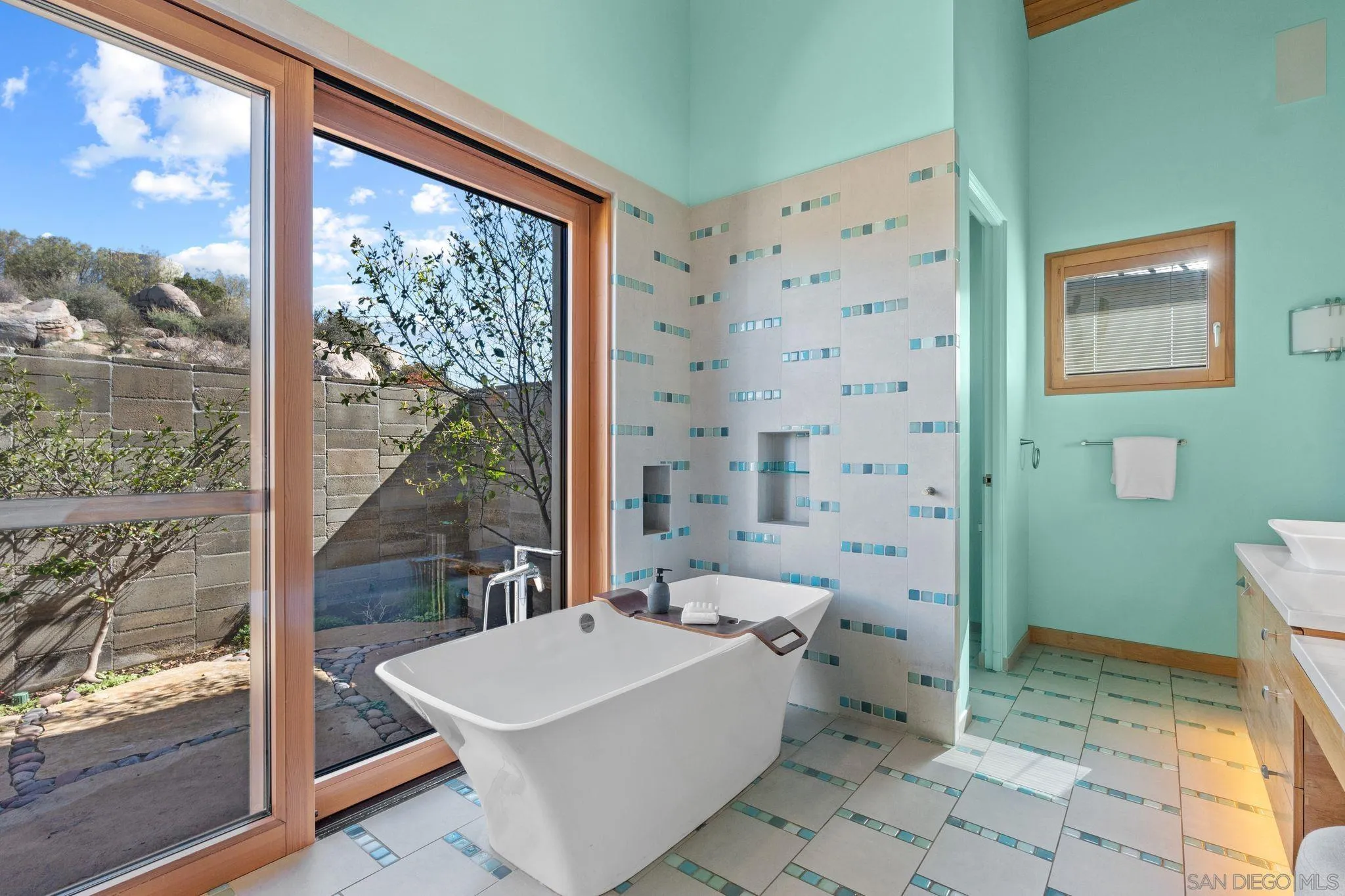 20385 Rancho Villa Road Ramona, CA 92065 - Photo 13 of 25 a bathroom with a sink a toilet and shower