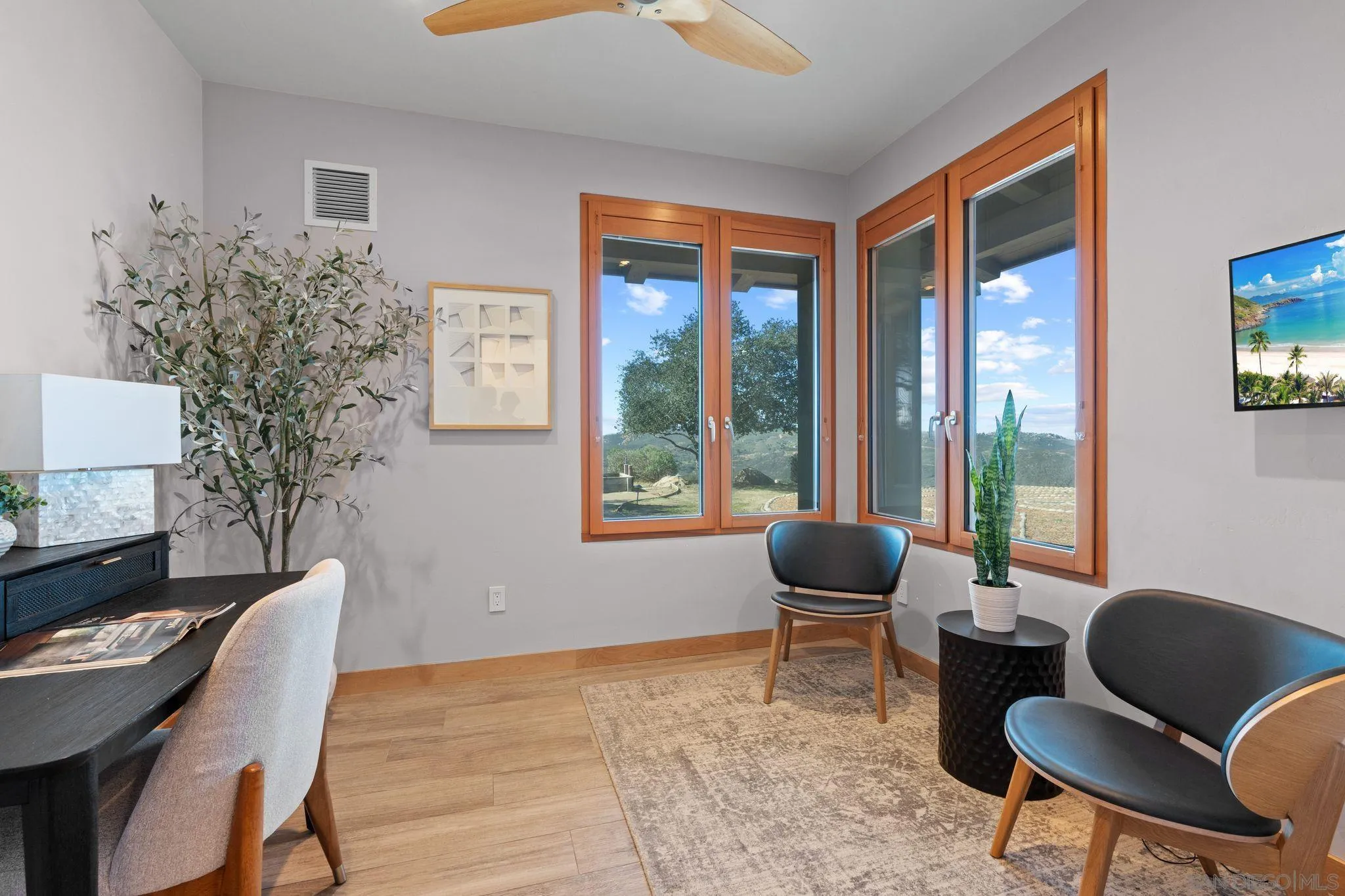 20385 Rancho Villa Road Ramona, CA 92065 - Photo 17 of 25 a living room with furniture and large windows