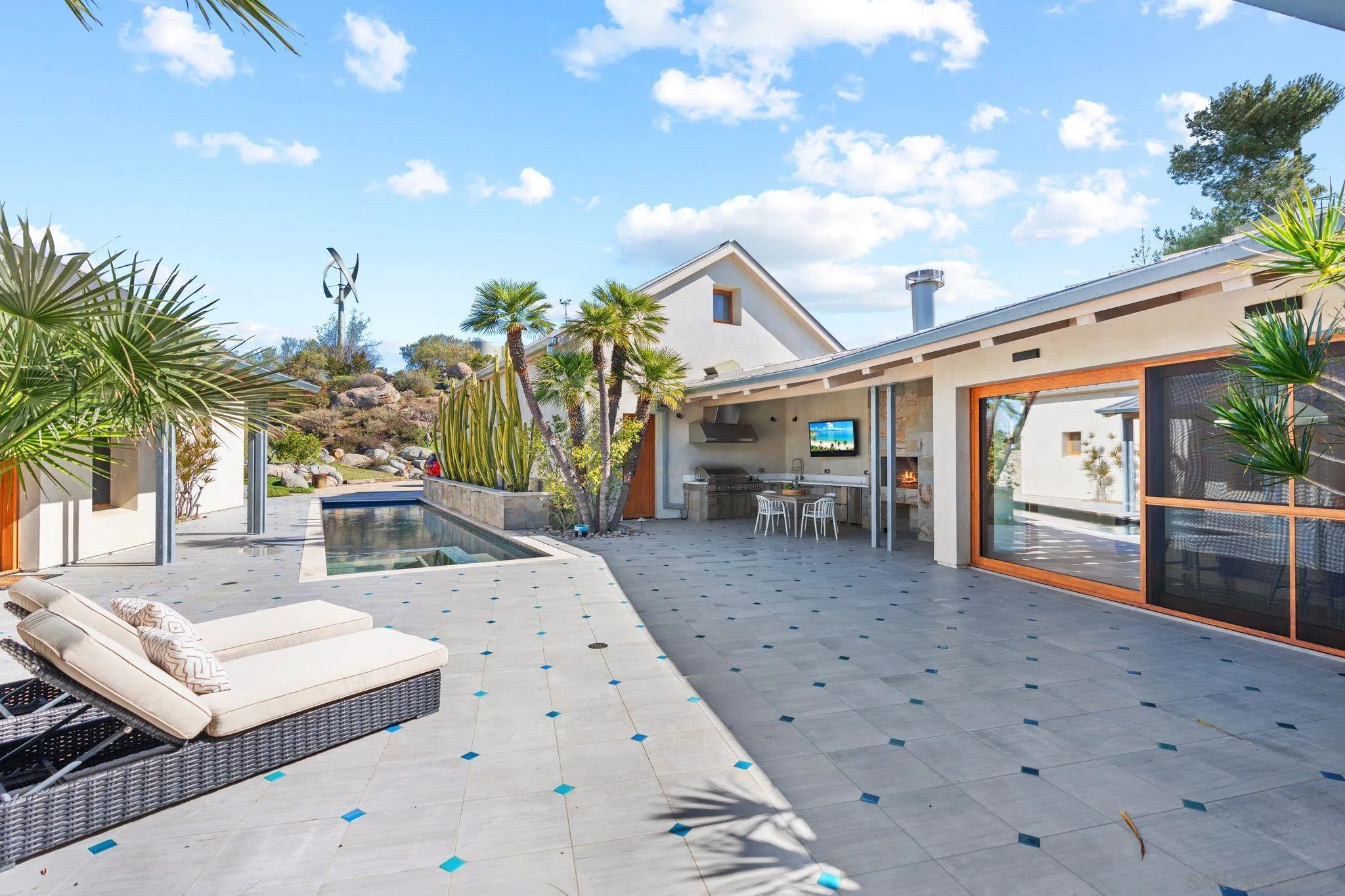 20385 Rancho Villa Road Ramona, CA 92065 - Photo 20 of 25 a view of a porch with furniture