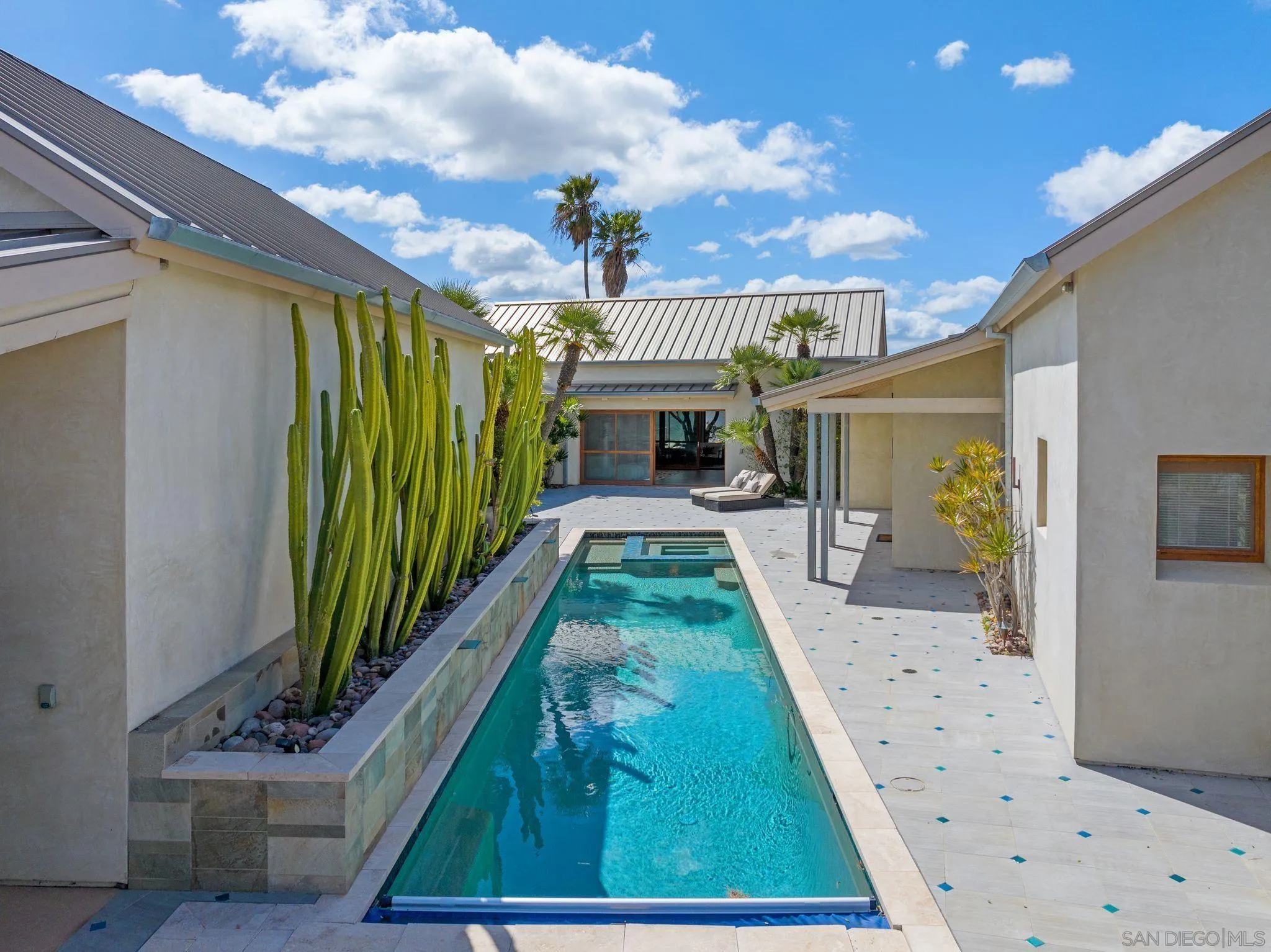 20385 Rancho Villa Road Ramona, CA 92065 - Photo 21 of 25 a view of a patio with couches and potted plants