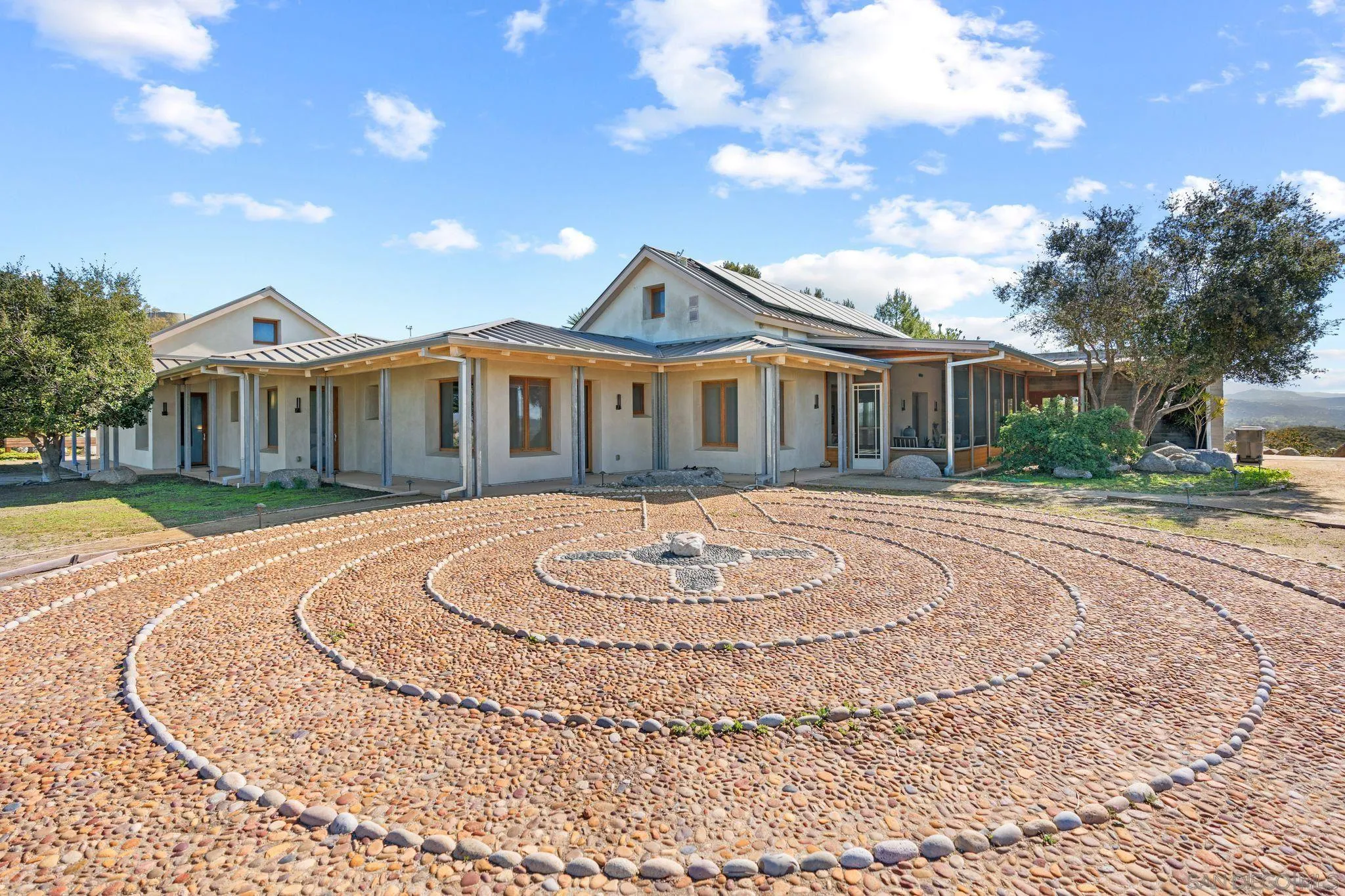 20385 Rancho Villa Road Ramona, CA 92065 - Photo 22 of 25 a front view of a house with a yard