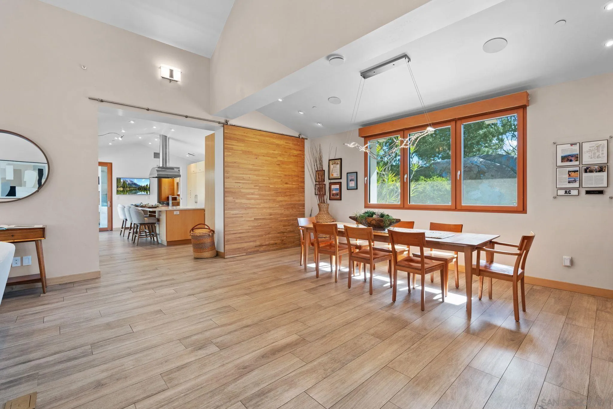 20385 Rancho Villa Road Ramona, CA 92065 - Photo 9 of 25 a view of a dining room with furniture window and wooden floor