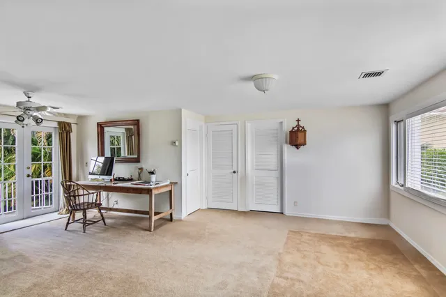 a view of work space with windows