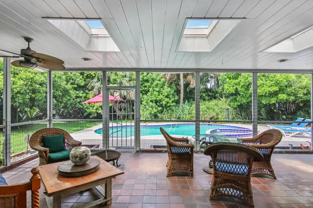 a outdoor living space with furniture and garden view