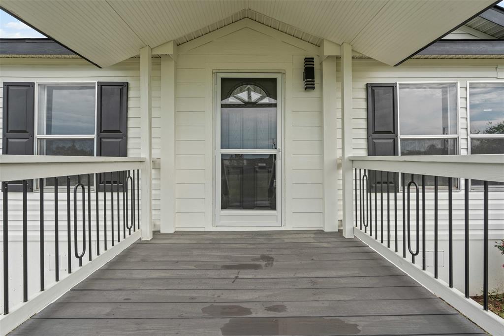 430 Indian Hills Road Bowie, TX 76230 - Photo 15 of 36 a view of a porch