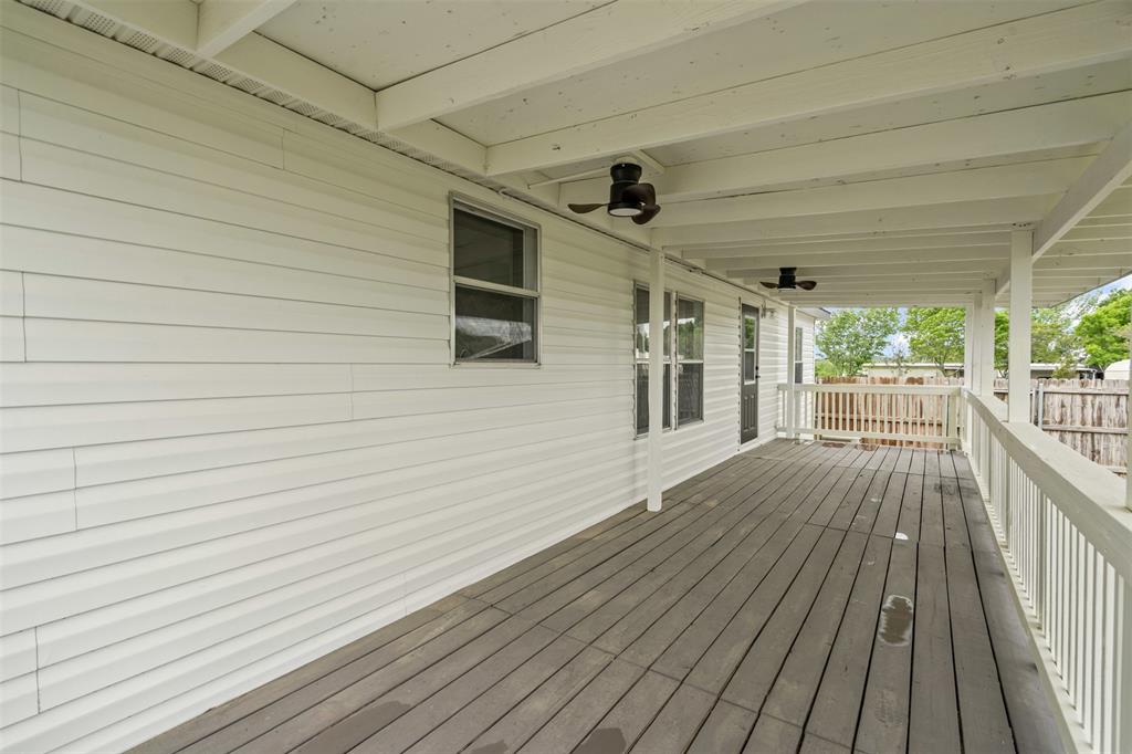 430 Indian Hills Road Bowie, TX 76230 - Photo 16 of 36 a view of a house with wooden floor