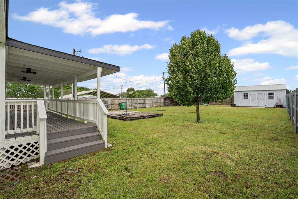 430 Indian Hills Road Bowie, TX 76230 - Photo 17 of 36 a view of a backyard