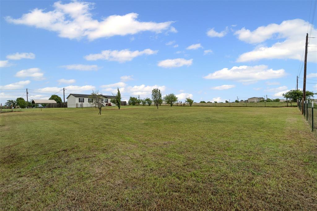 430 Indian Hills Road Bowie, TX 76230 - Photo 34 of 36 a view of a ocean with a big yard