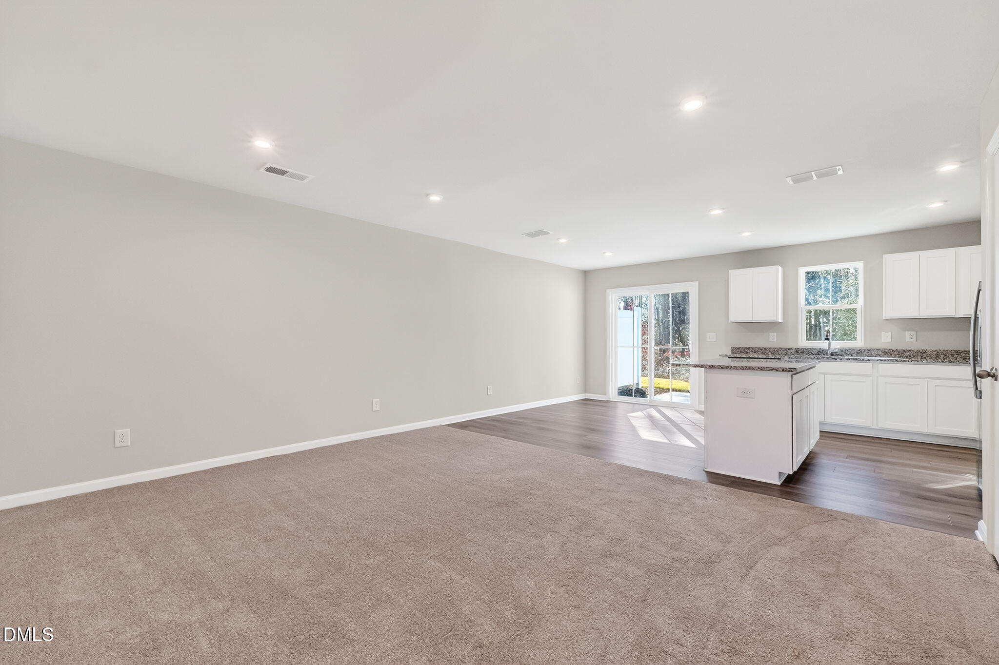 6684 Gibraltar Rock Drive Raleigh, NC 27610 - Photo 13 of 33 a view of kitchen with refrigerator and window