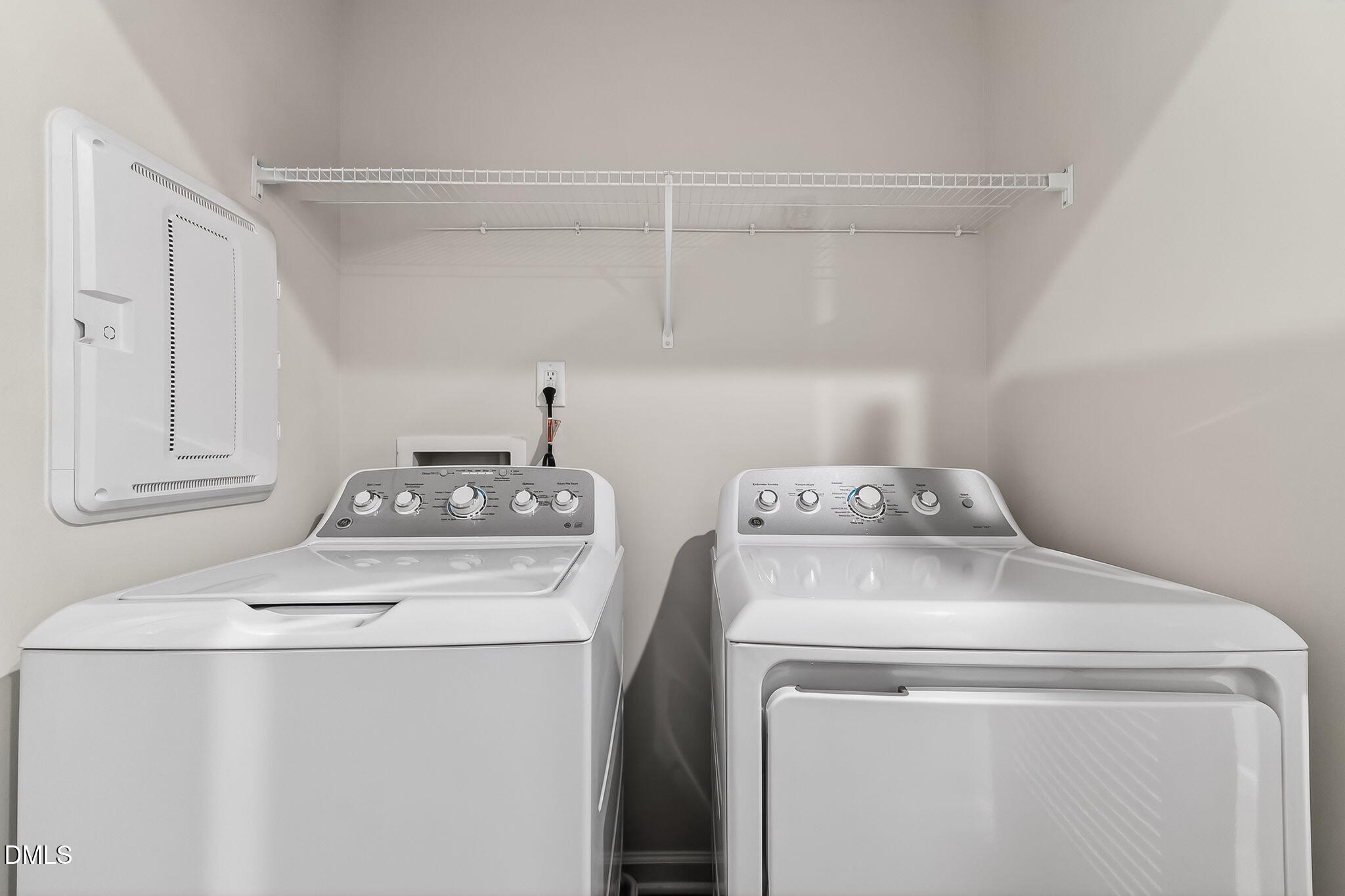 6684 Gibraltar Rock Drive Raleigh, NC 27610 - Photo 22 of 33 a utility room with dryer and washer