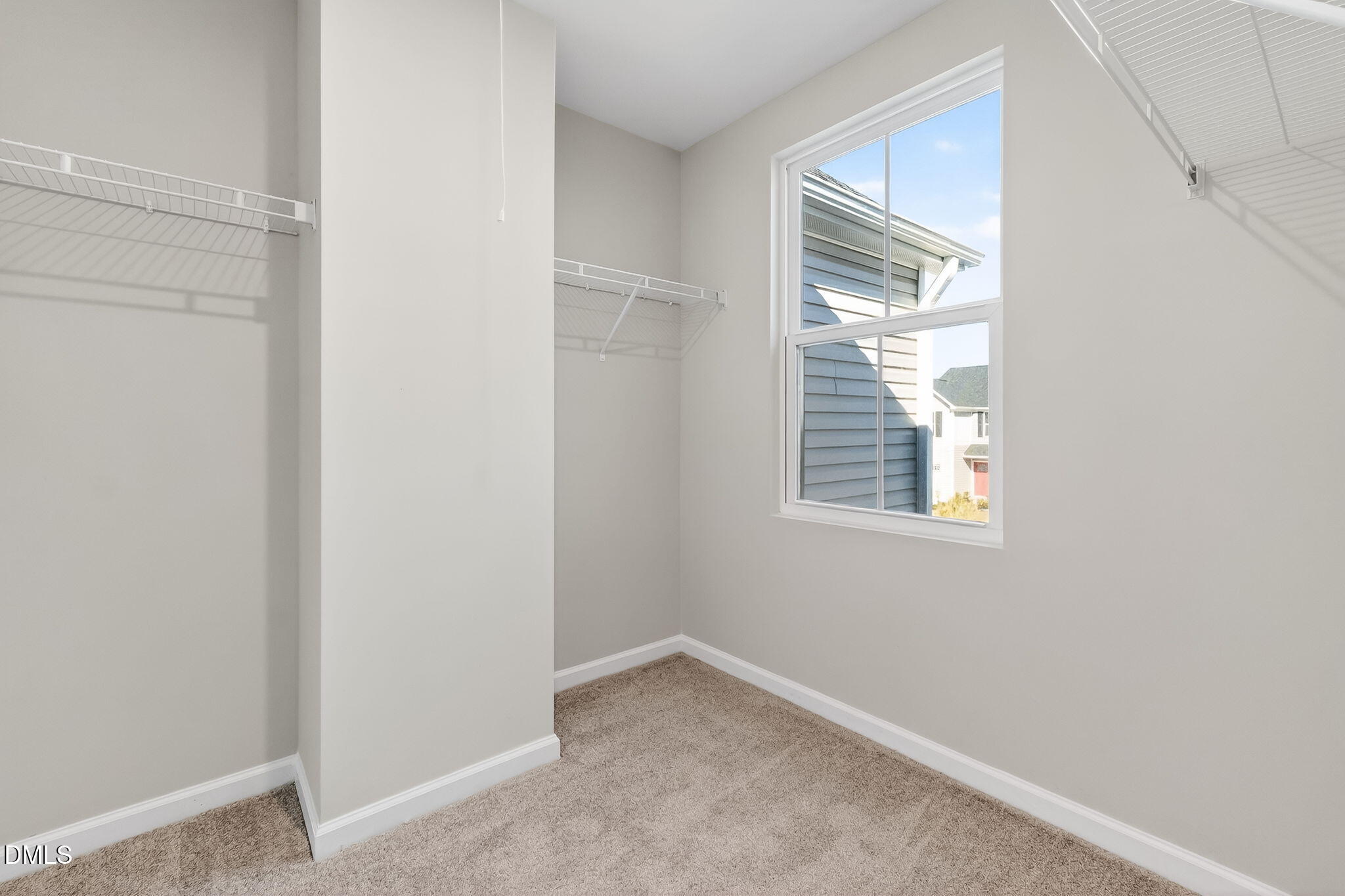 6684 Gibraltar Rock Drive Raleigh, NC 27610 - Photo 30 of 33 a view of an empty room with a window