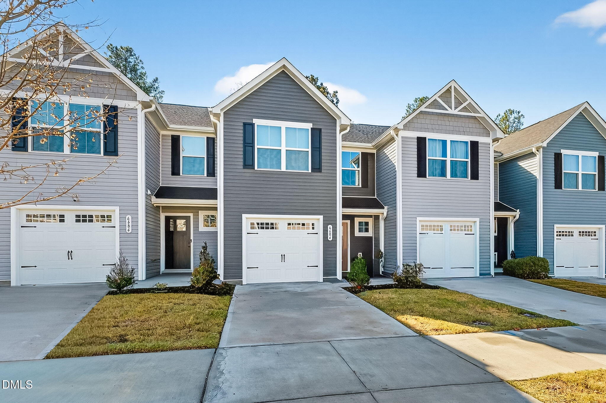 6684 Gibraltar Rock Drive Raleigh, NC 27610 - Photo 3 of 33 front view of a house with a yard