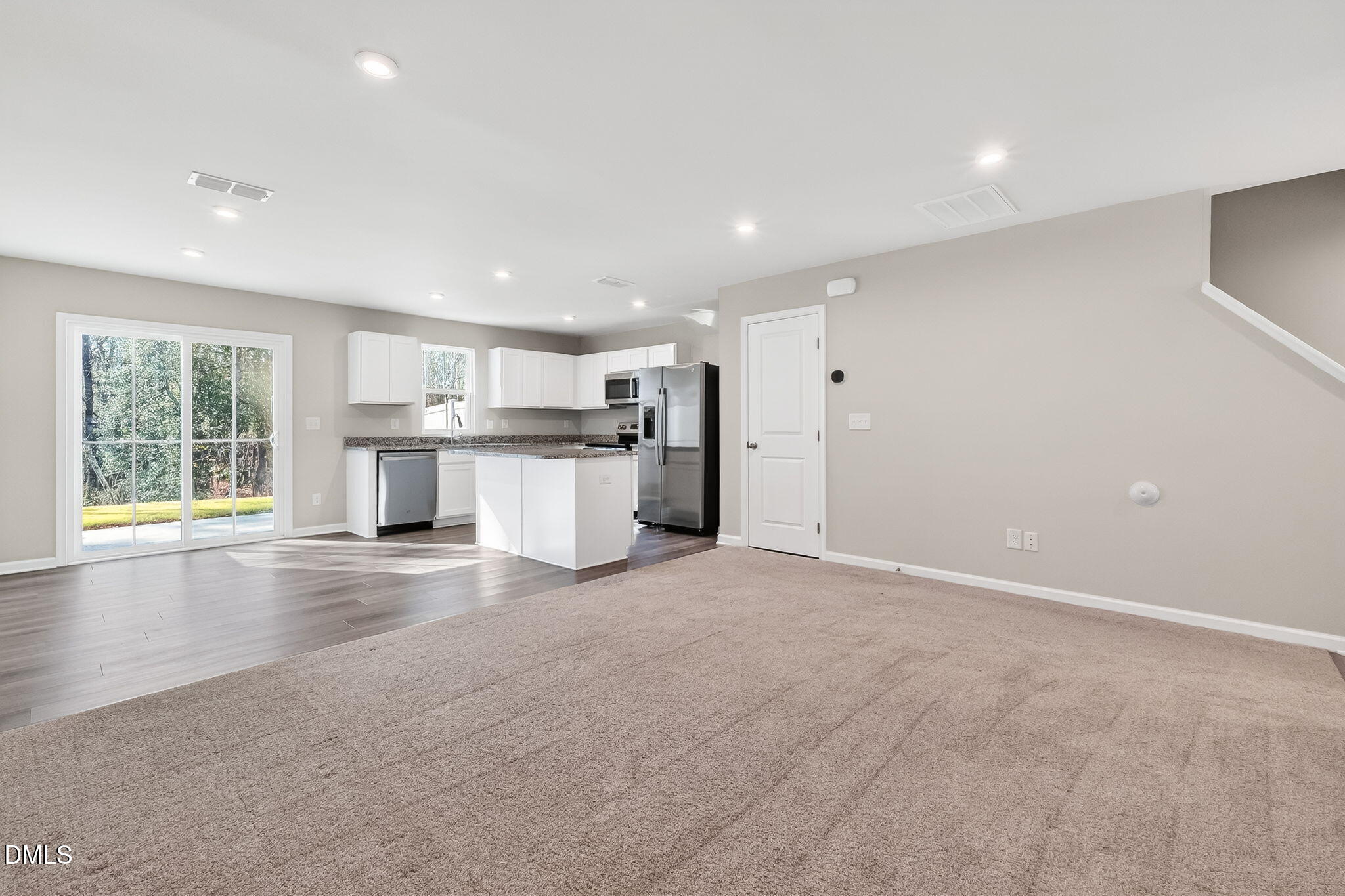 6684 Gibraltar Rock Drive Raleigh, NC 27610 - Photo 6 of 33 a view of a kitchen with a sink and a window